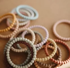 MUSHIE - SILIKON-ARMBAND(3er-Pack)lila/cyan/zarter Pfirsich 5 MUSHIE - SILIKON-ARMBAND(3er-Pack)lila/cyan/zarter Pfirsich -Spielzeug Puzzle Geschäft mushie silikon armband 3er pack lila cyan zarter pfirsich 3